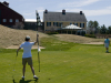 Golfers enjoy an early season round at Okemo Valley Golf Club.