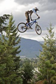 High-flying mountain bikers hit Whistler's Kokanee Crankworks. Photo: Yorick Carroux.