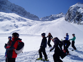 Skiers enjoying the day in the Adamello ski area