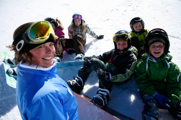 Ski instructor with her students. Courtesy of Park City Mountain Resort.