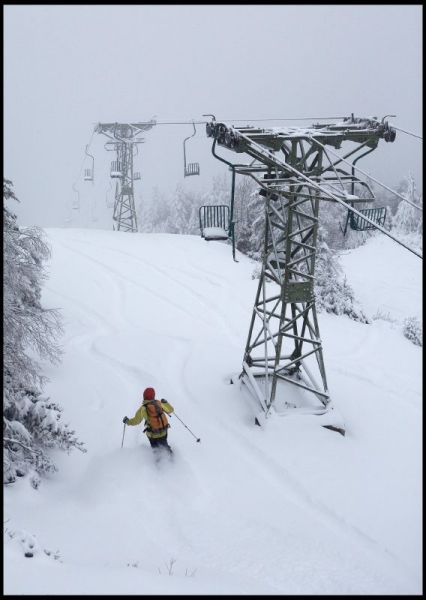 This skier is majoring in powder at Mad River Glen.