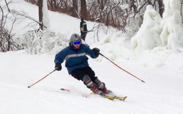 Skiers with chips in cards avoid lines.