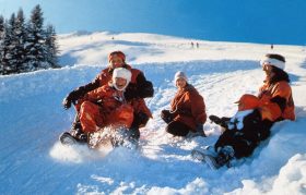 Family fun in the snow in Switzerland