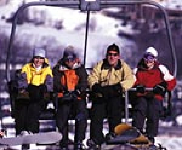 Clubs run outings to areas like Camelback, where these skiers are riding the quad.
