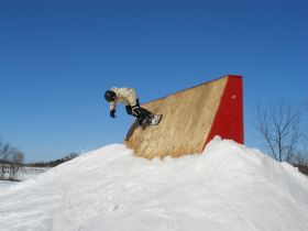 A snowboarder works out in one of Sunburst's three terrain parks.