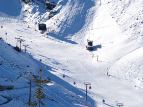 Europe's Sierra Nevada attracts early season skiers.
