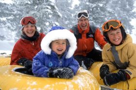 Don't always rush out to the slopes. Have some family fun. Tubing is a great option.