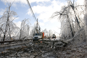 Utility crews work on downed power lines up the road from Wachusett Mountain Ski Area in Princeton.