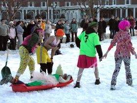 Human dogsled race at Dartmouth Winter Carnival.