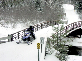 Crossing the scenic Wisconsin River near Eagle River when it's still a small stream.