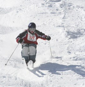 Competitor bounces down the moguls on Outer Limits.