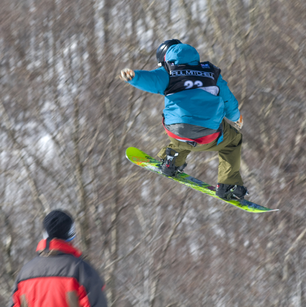 Sam Hulbert sails off a jump in slopestyle practice Saturday. Photo by Roger Leo.