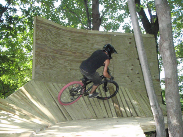 Mountain biker on the North Shore Downhill Mountain Park.