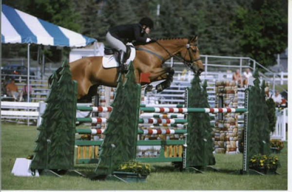 Rider Christine McCrea on Promised Land at the Lake Placid Horse Show.