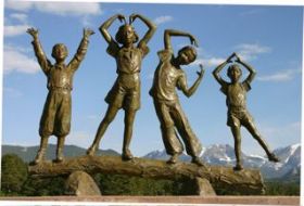 The statue by Jane DeDecker outside the YMCA of the Rockies-Esres Park Center.