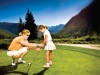 A young golfer receiving a lesson at Vail.