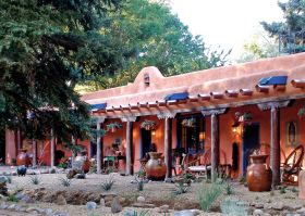 The Adobe & Pines Inn's Southwestern ambience starts at its lovely porticoed entrance.