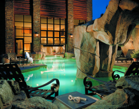 Relax by the Snake River Lodge's indoor/outdoor pool after your spa treatment