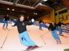 Skiers on an indoor dry slope at the British Ski & Snowboard Show.