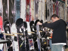 A visitor looking at snowboards at the Minnesota Ski & Snowboard Expo.
