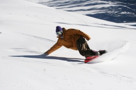 A snowboarder rips it on Copperopolis at Copper Mountain.