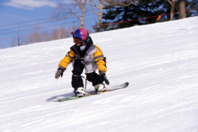 A little snowboarder rips it up at Beaver Creek.
