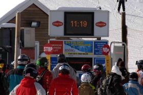 Skiers and boarders line up to ride up at Stratton.