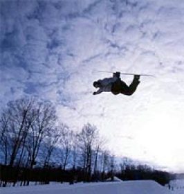 Snowboarder airborne at Loon.