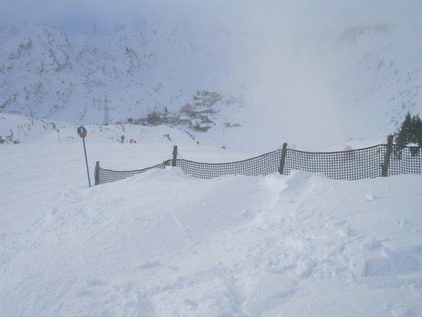 Skiing down to St. Christoph during a snow storm.
