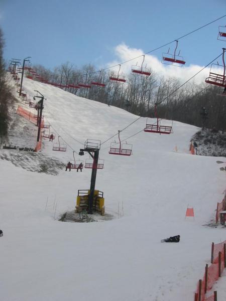 Riding lift to Cub Way/Castle Run looking up Mogul Ridge.