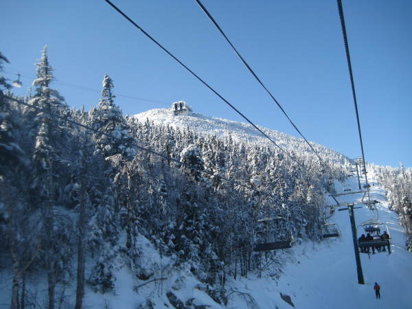 flyer chair looking up at the tram house at the summit