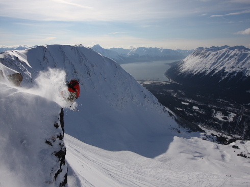 Clint Butler goes big off the Headwall on a perfect day! Photo courtesy of Simon Evans.