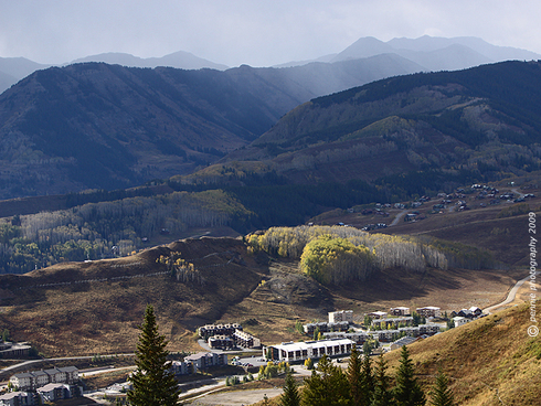 Fall View of from the Ski Area : : : : : : : :
Friday’s final photo is overlooking Mt. Crested Butte with the Meridian Lake homes, Slate River Valley and Schuykill Ridge in the background. This season’s fall color has been a bit different than what we typically see around Crested Butte. There are large groves of aspen that seem to be hanging on to their greenery quite a bit longer than usual. Other groves and pockets seemed to either skip changing to gold or did so very quickly and jettisoned their leaves before we knew it. I’m not sure if that’s due to the little rain we saw in the late summer or if some other factor is causing the variation.
: : : : : : : : Thursday afternoon’s snow squalls warmed to evening rain showers in the Crested Butte area. It looks like the week-long moisture cycle we’ve seen is drying out, leaving us with forecasted sun and warming temps into the weekend. I, for one, am a big fan of nice weekend weather, and fall is a great time for getting out on your favorite two-wheeled toy to enjoy the high country single track. If you’re the same, get spontaneous and make quick make some plans to visit CB this weekend, check out our fabulous trails and enjoy what may be the last weekend with leaves on the aspens!
: : : : : : : : Have a great weekend!