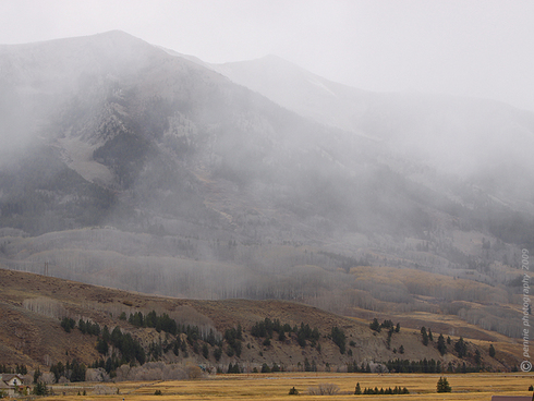 Sunday Afternoon’s Snow in Crested Butte     : : : : : : : :   
Hi All—Monday’s shot is of the snow showers working their way down Whetstone Mountain on Sunday afternoon during the Bronco’s game.  While conditions looked sunny in Gunni, Crested Butte saw clouds and moisture much of Sunday afternoon.  Saturday was a sunny, but breezy affair in the Gunnison Country.  I made it to Hartman Rocks for an early afternoon spin on the decomposed granite single tracks of Rocky Ridge, Buddy Bear, Josie’s, Gateway, Lower Luge and what we used to call The Back of Hogs Back, while the rest of my family headed for the Gunnison Rec center for a kiddo rendezvous at the pool.  Fun was had by all!
     : : : : : : : :    Things around Crested Butte Mountain Resort will continue to be busy this week with everyone working to get ready for the ski season opener on November 25th.  The year-round crews will continue to get after it to wrap up their projects (especially the on-mountain projects that need to be completed before snow closes the mountain) and the seasonal managers and supervisors continue to trickle in, looking to get up to speed with what’s new at the resort this winter, as well as prep for their incoming staffs.  As of last week, the Ice Bar Restaurant remodel was still on track for a mid-November completion.  The snow makers were setting up their hoses and guns in the base area, as well, letting us know that they’re ready to blow as soon the weather and calendar allow. 
     : : : : : : : :    I bet you’re starting to think seriously about your ski vacation this winter . . . you ought to be planning on making it to Crested Butte!  Every indication is that it’s going to be another excellent winter in CB, so go ahead and give Crested Butte Vacations a call via the phone number below to put together your Rocky Mountain ski adventure today!  Have a super start to the week out there and we’ll shoot for doing it again tomorrow.  
