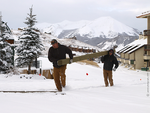 More Snow and Prepping for New Signs      : : : : : : : : : : : :   
Thursday’s shot is of the hard working guys on the Special Projects team at Crested Butte Mountain Resort, getting it done once again.  This is Daren and Travis hauling a post for the new signs at the bottom of the Silver Queen and RLX  lifts.  There’s a never-ending list of special projects at the resort, so these guys stay perpetually busy.  Thanks for all of your work, guys!
      : : : : : : : : : : : :   
We have about six inches of snow on the ground in the base area and about twice that up on the mountain!  It’s looking white and beautiful out there—exciting to see!  Ready to go skiing?  
