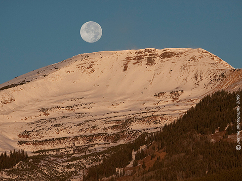Moonset Over Mt. Emmons’ Red Lady Bowl     : : : : : : : :   
Hi All—Wednesday’s shot is of Tuesday morning’s “moonset” over Mt. Emmons’ Red Lady Bowl.  Happy Hump Day out there—have a good one!   
